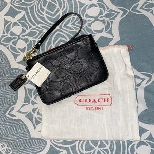 Black leather Coach Wristlet